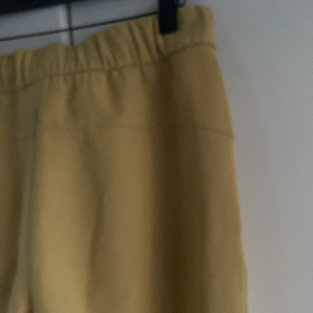 Lululemon On the Fly 7/8 Pant *Woven - Picture 13 of 15